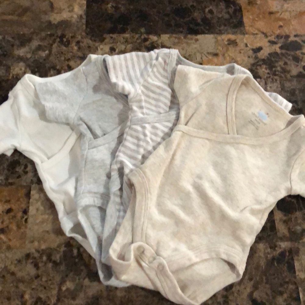 Bundle of 4 newborn onesies